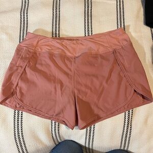 Pink athletic shorts with built in underwear lining size large # 2184